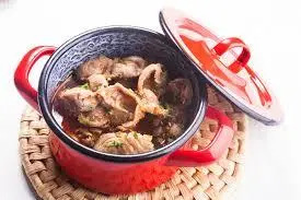 Cold chicken gizzards with tomato sauce