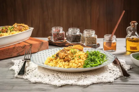 Galinhada con Frango à Passarinho Friato
